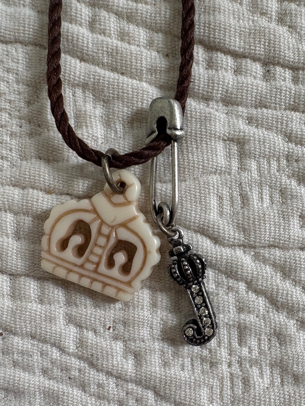 Juicy Couture Necklace with Rhinestone 'J' and crown Charm - Brown Cord